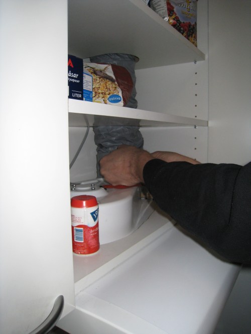 Demontering av slang inför rensning.